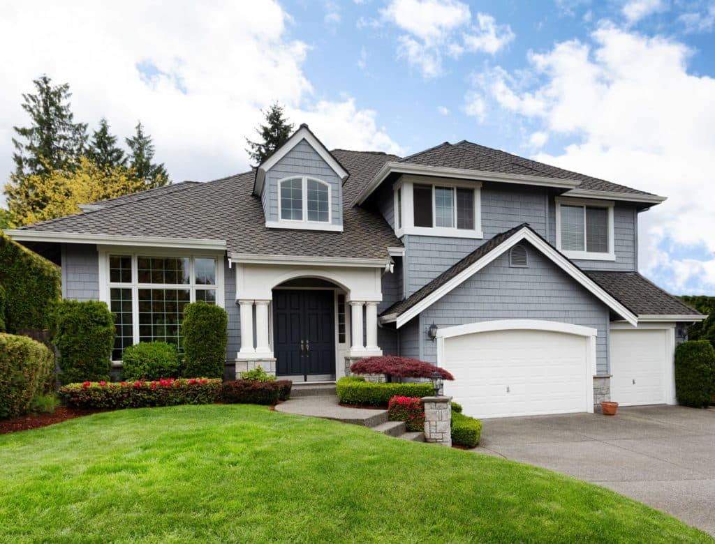 residential home with grass front yard