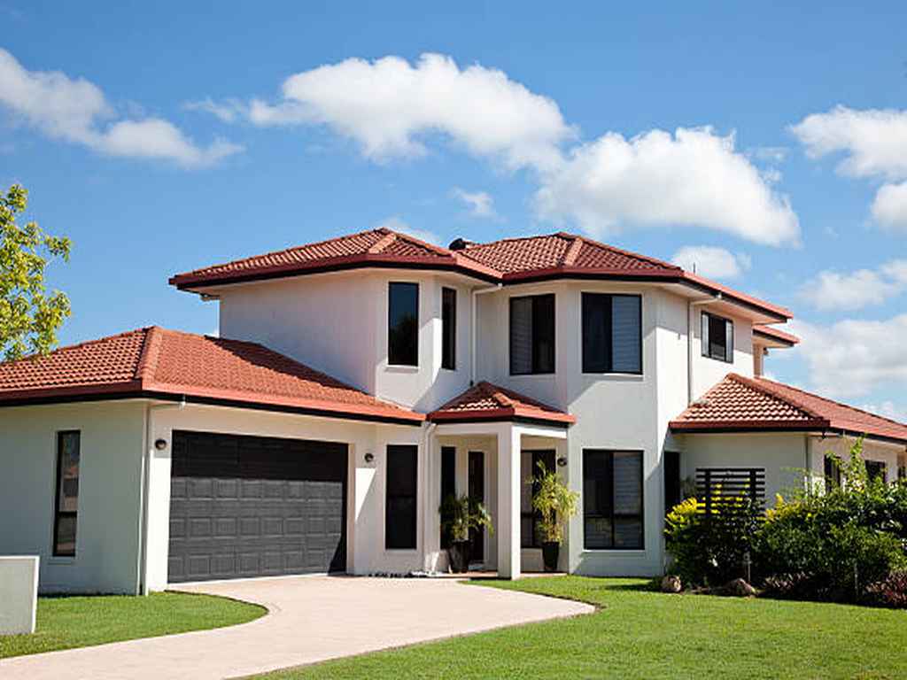 view of a home with a tile roof