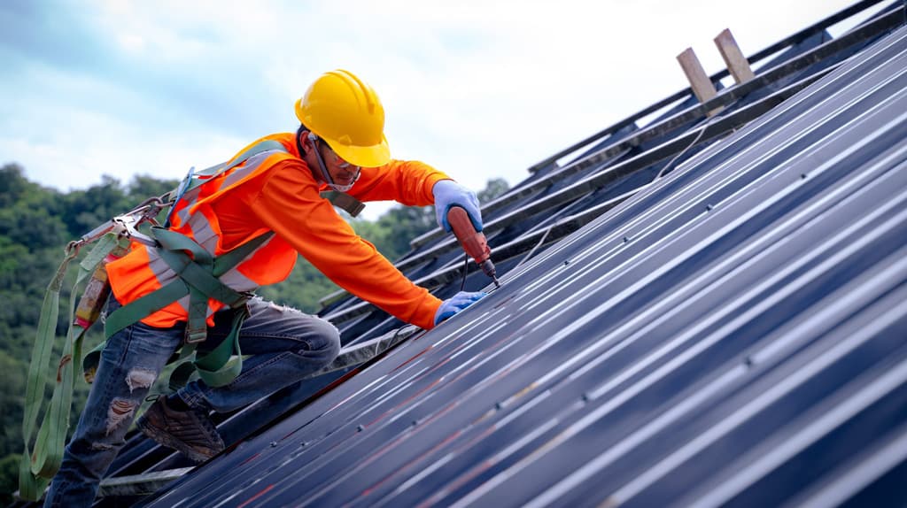 Rhino Roofers crew installing a commercial roof system