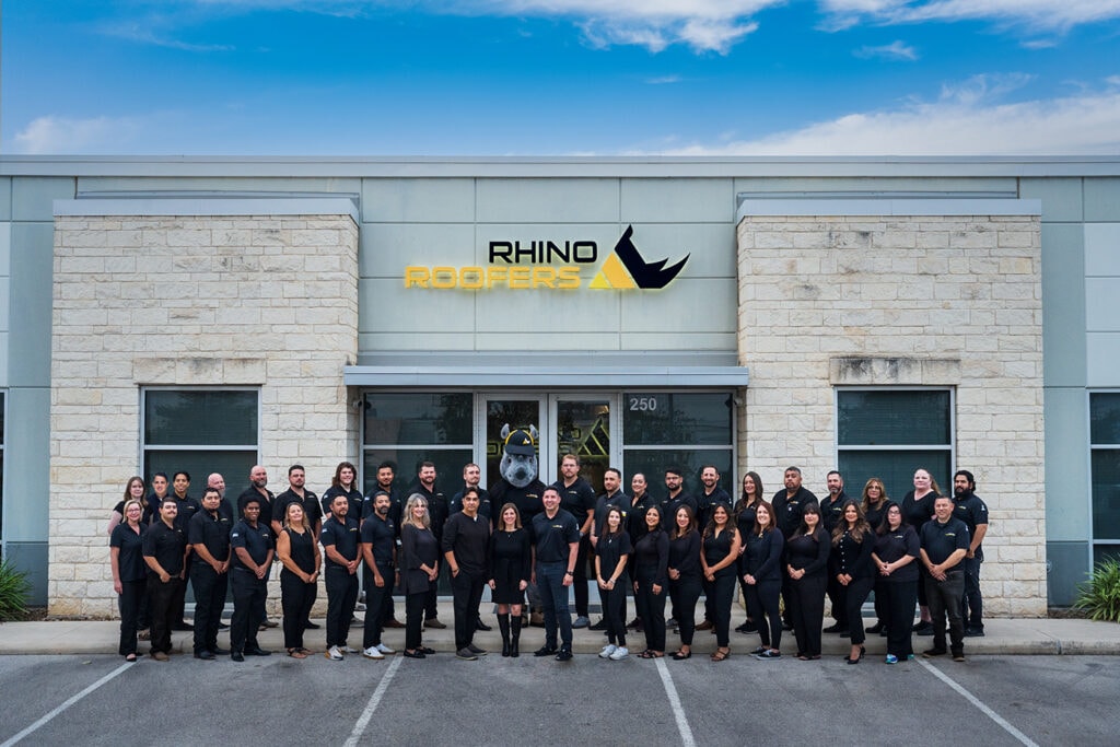 Rhino Roofers team celebrating San Antonio Express-News Top Workplaces 2025 award for outstanding roofing company culture and employee satisfaction.