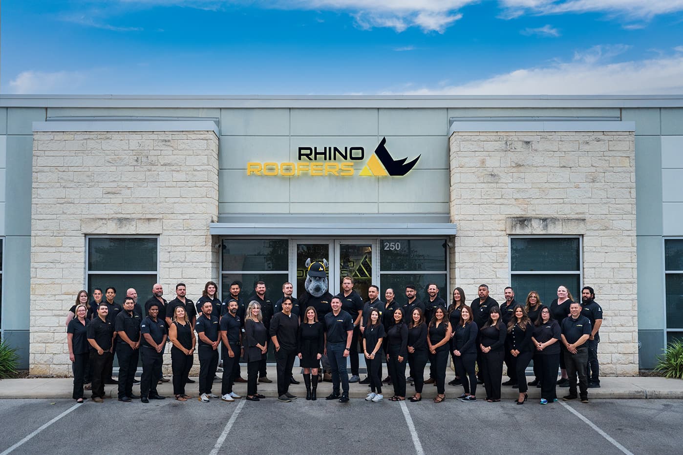Rhino Roofers team celebrating San Antonio Express-News Top Workplaces 2025 award for outstanding roofing company culture and employee satisfaction.