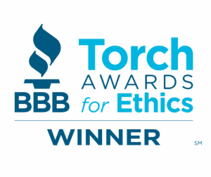 BBB Torch Award for Ethics trophy awarded to Rhino Roofers, recognized for ethical business practices and outstanding customer service in San Antonio and Austin.