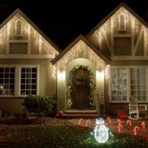 residential home with Christmas lights