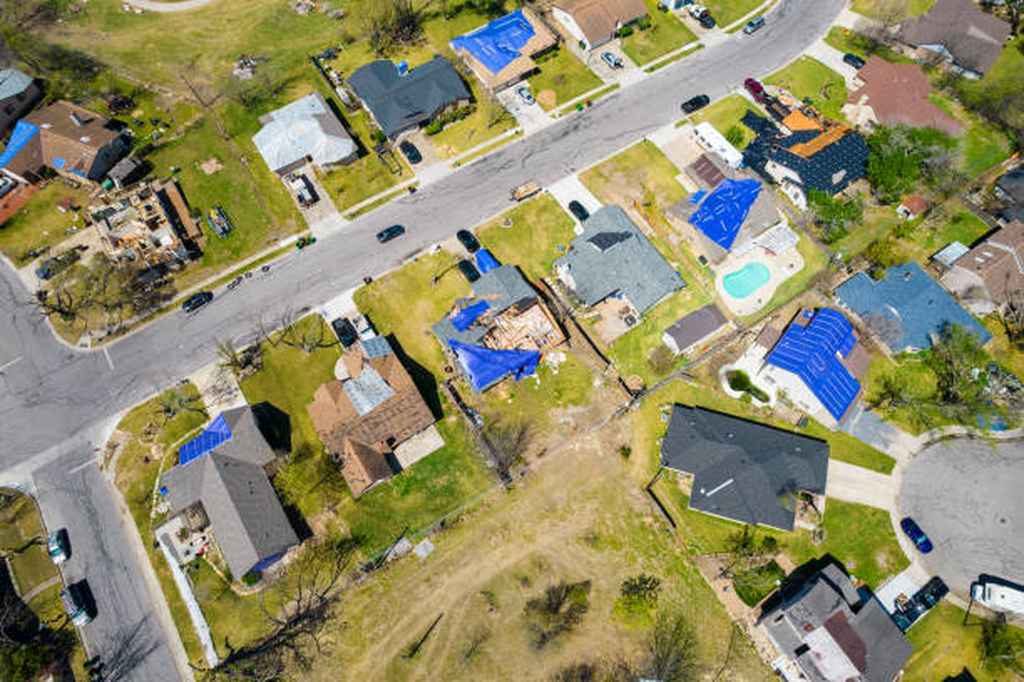 overview of residential neighborhood with roof replacements
