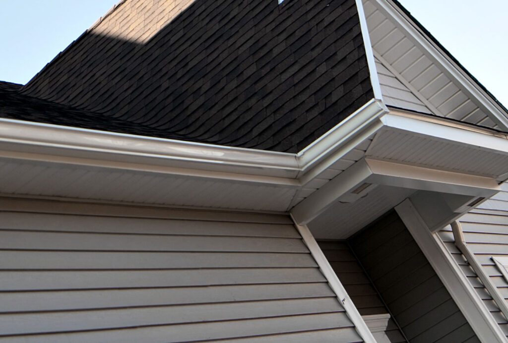 seamless gutters on a shingled roof