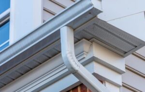 downspout from a seamless gutter