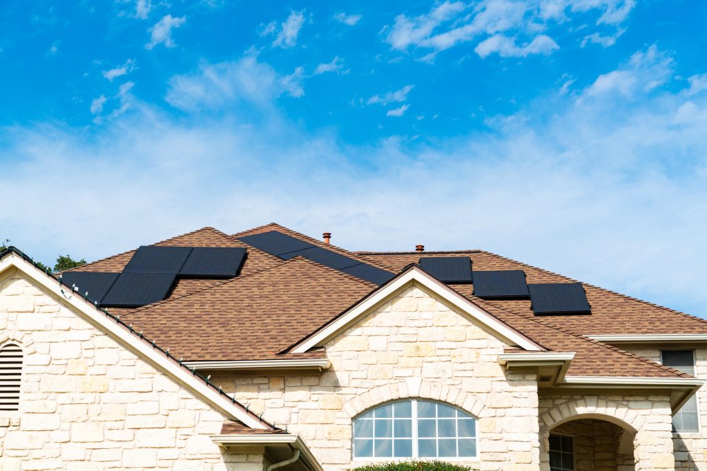 residential home with solar panels on roof