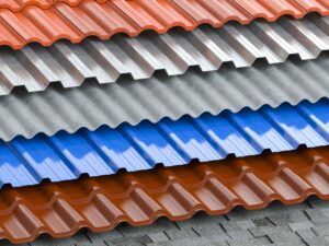 Diagonal array of metal roofing samples showing various patterns and colors ranging from terracotta to grey and vibrant blue, each with distinct corrugated profiles.