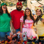 Rhino Roofers team dressed as Mario, Luigi, Princess Peach, and Bowser at the Kinetic Kids Family Unite Night in Helotes.